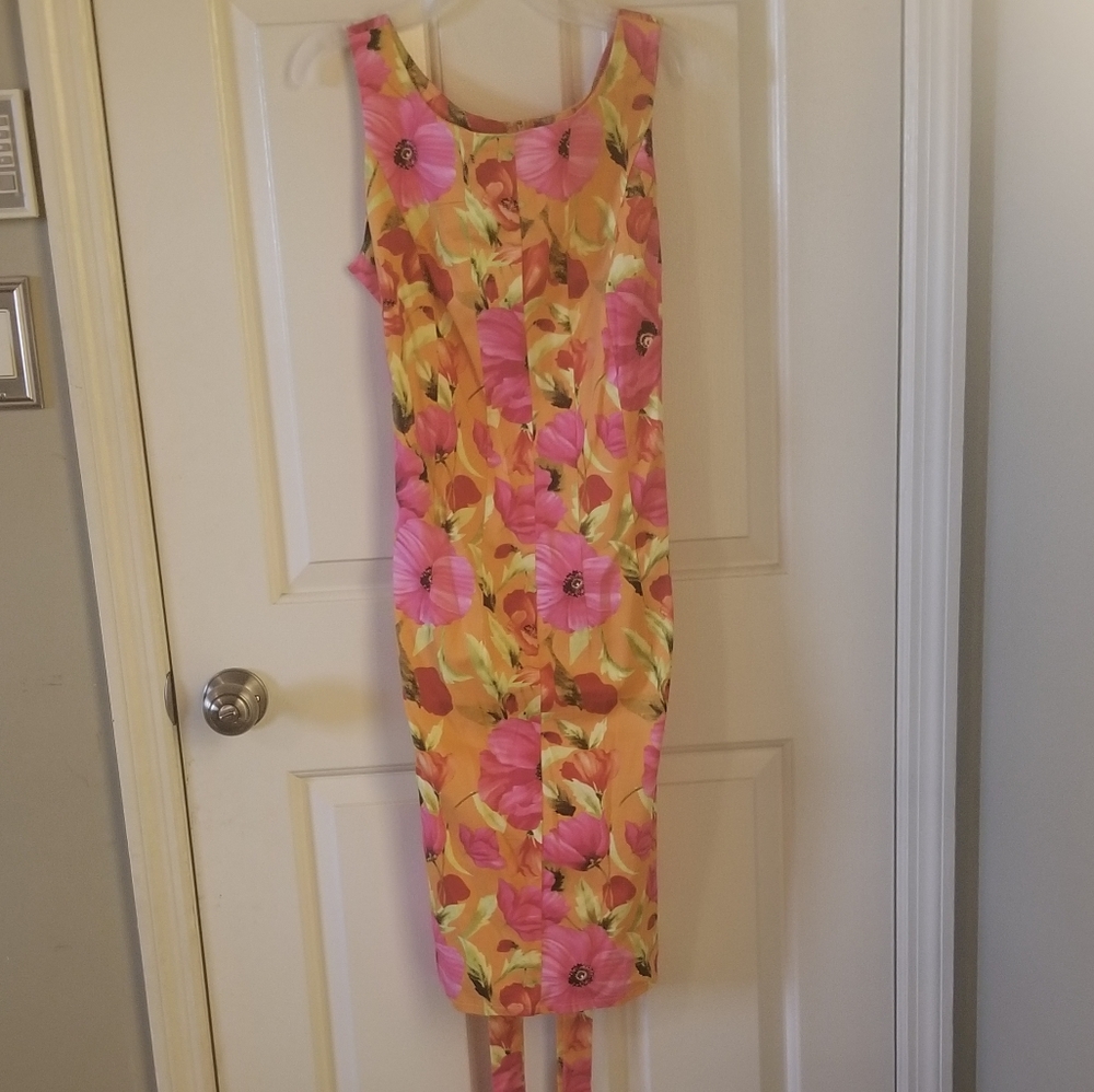 Bright pink floral sundress. Very colorful and cute.